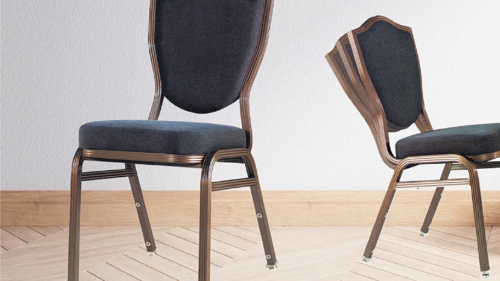 Two upholstered banquet chairs on a timber floor, showing backrest shape and frame